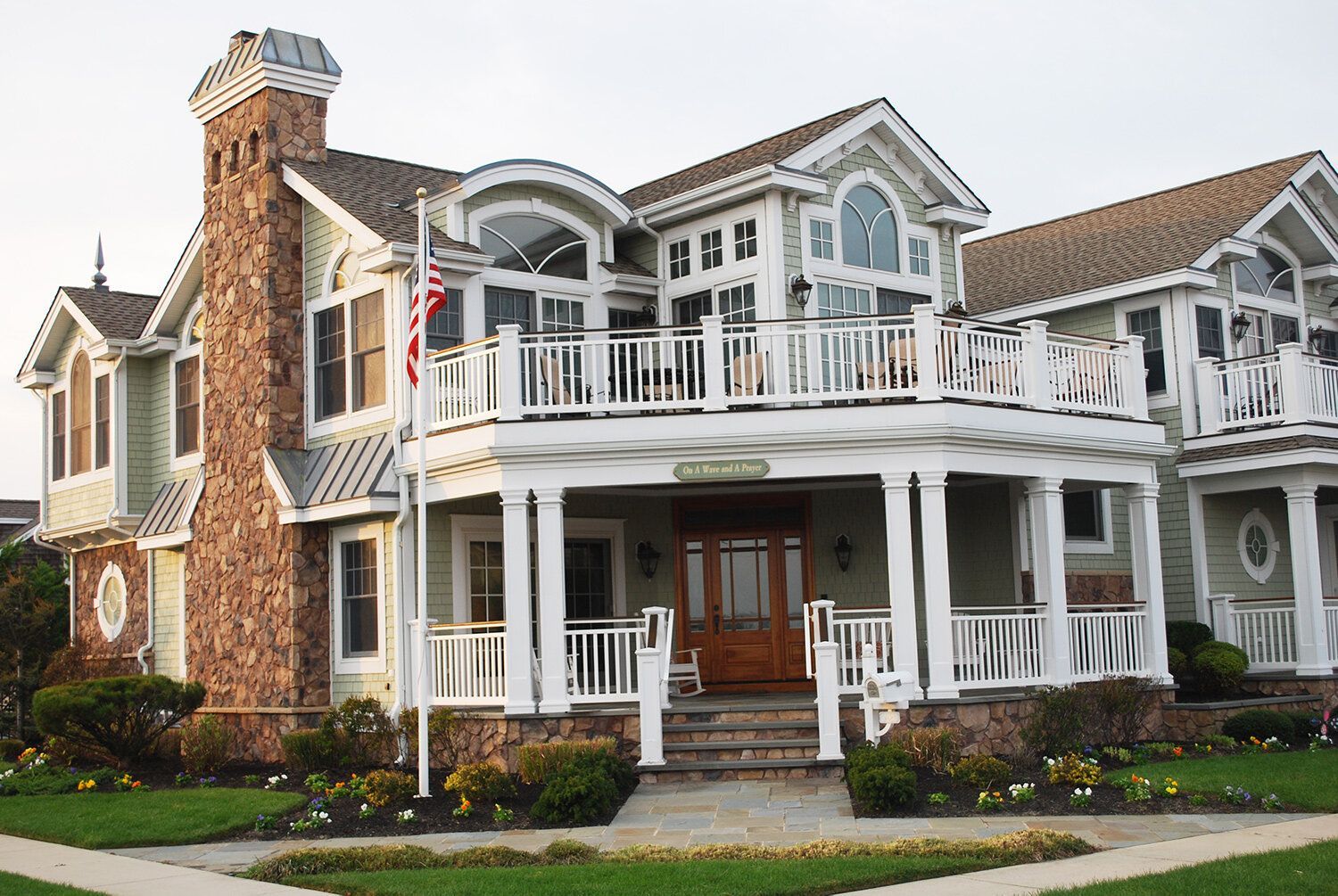 A large house with a lot of windows and balconies