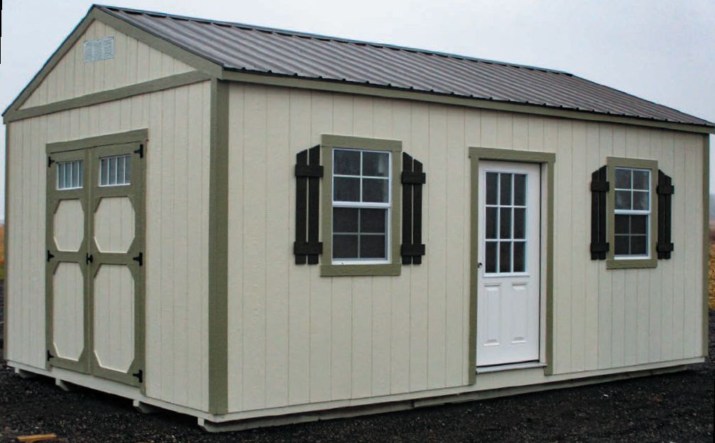 A shed with shutters on the windows and doors