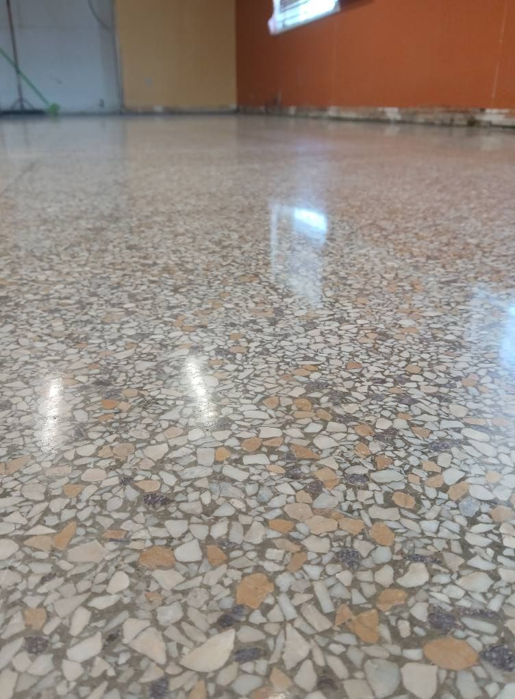 A close up of a terrazzo floor in a room.