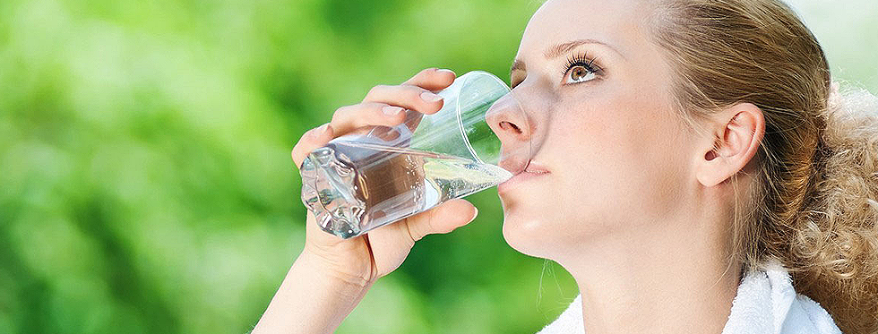 Lady drinking purified water