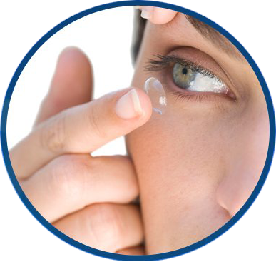 Woman putting contact lenses