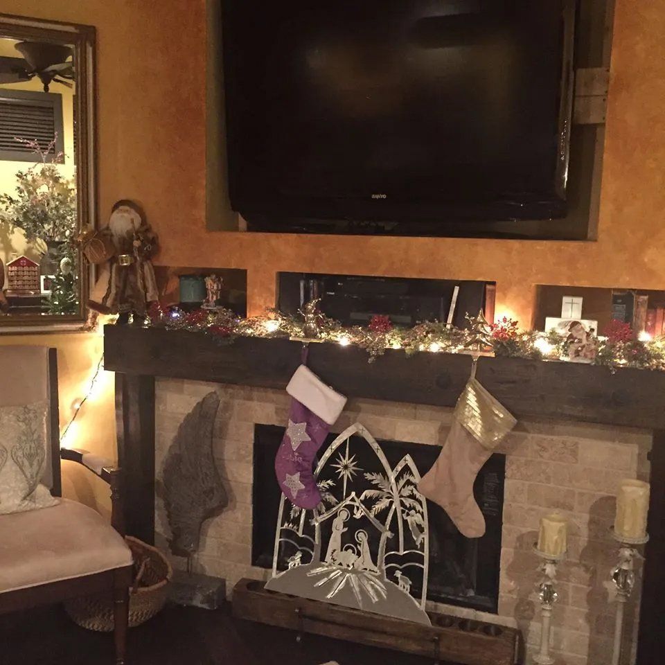 Nativity in front of a fireplace