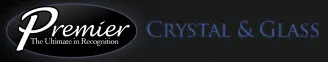 Premier Crystal & Glass logo. "Premier" in white script inside an oval, "Crystal & Glass" in blue.