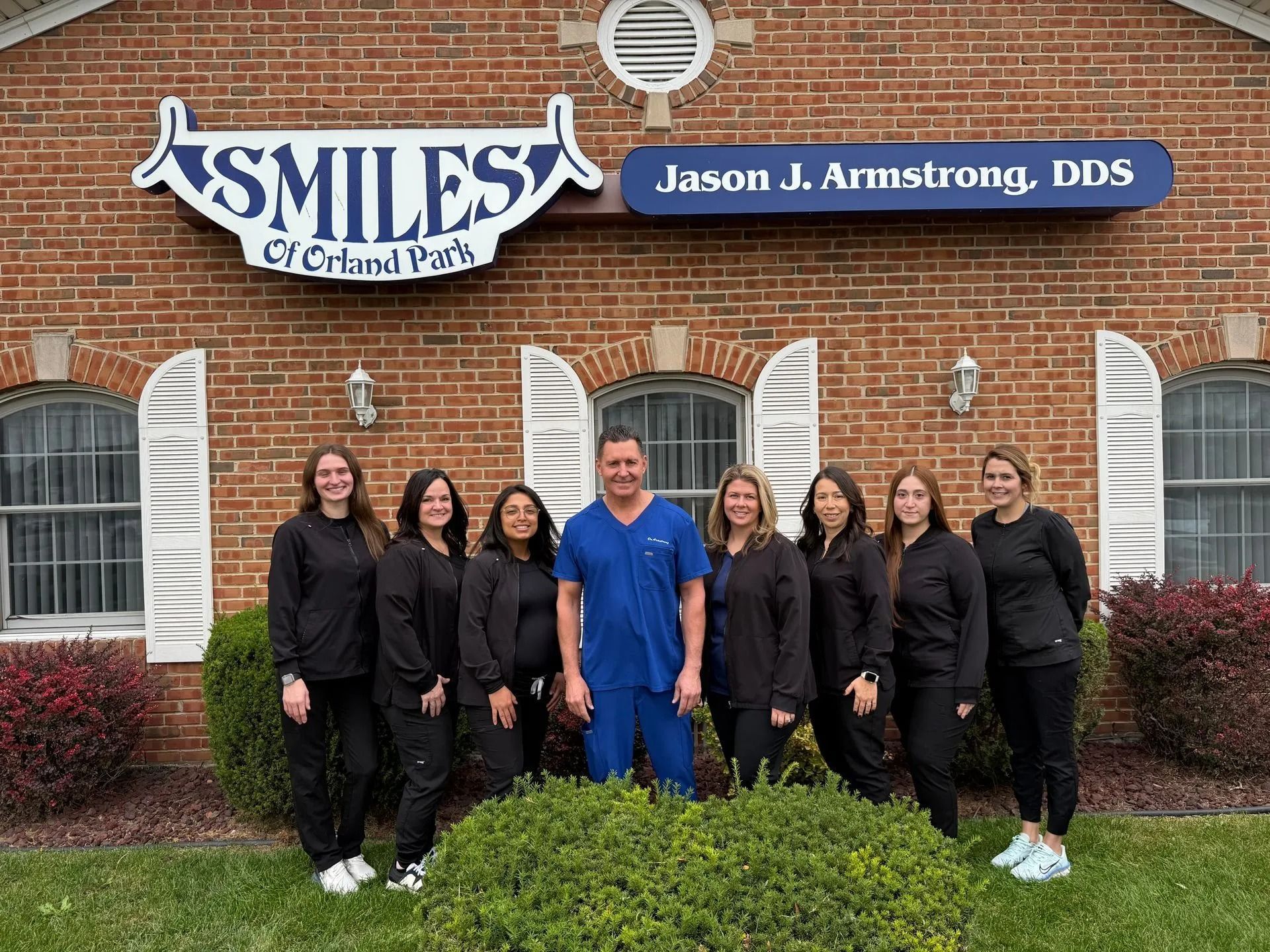 Staff posing in front of