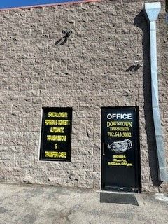 signs at the side of the shop