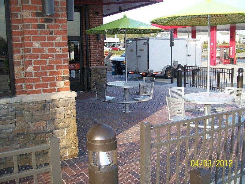 A photo taken on april 3 2012 shows a patio area with tables and umbrellas