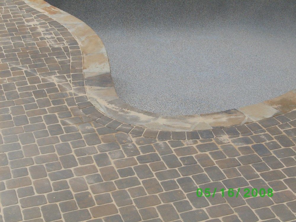 A picture of a brick walkway taken on june 1st 2012
