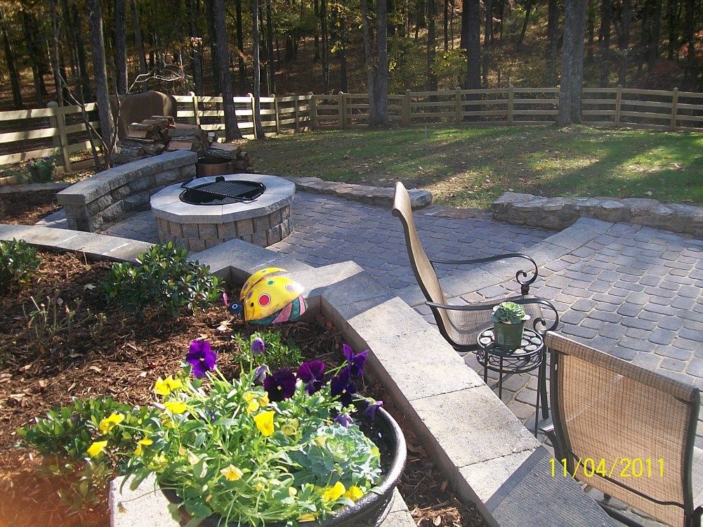 A picture of a patio with a fire pit taken on 11/04/2011