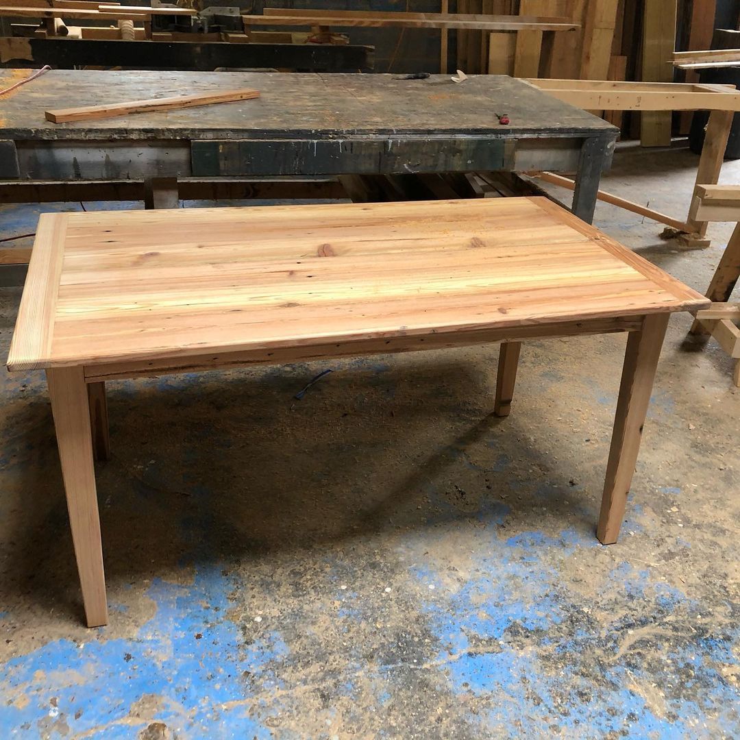 a wooden table in a workshop