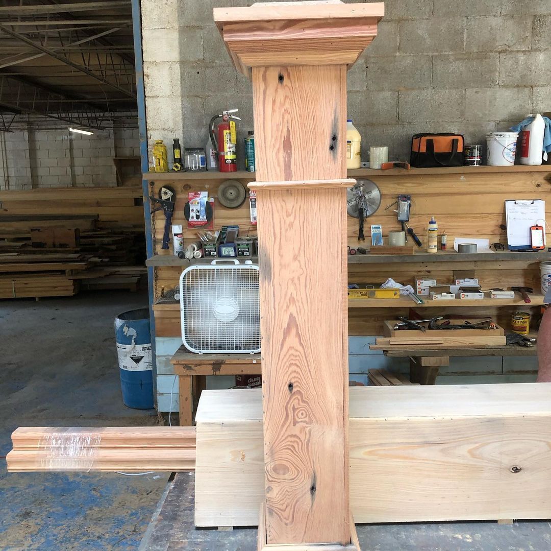 a wooden post in a workshop