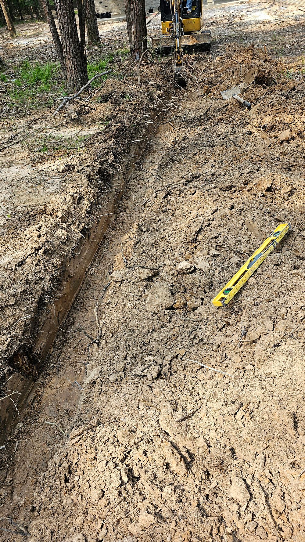 Drainage system installation in Trailwood Village, Kingwood, TX by Orion’s Rain