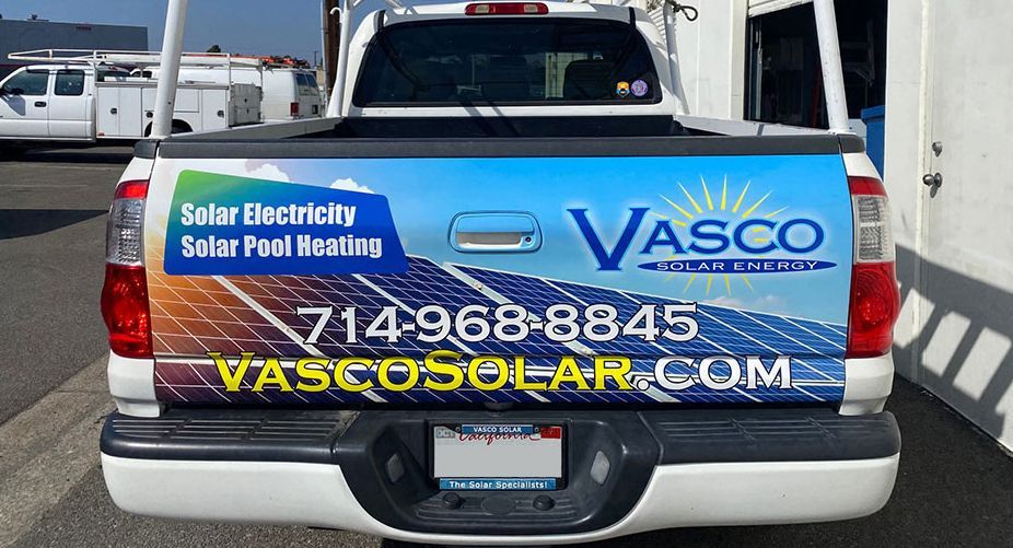 A truck with a sticker on the back that says vasco solar electricity solar pool heating