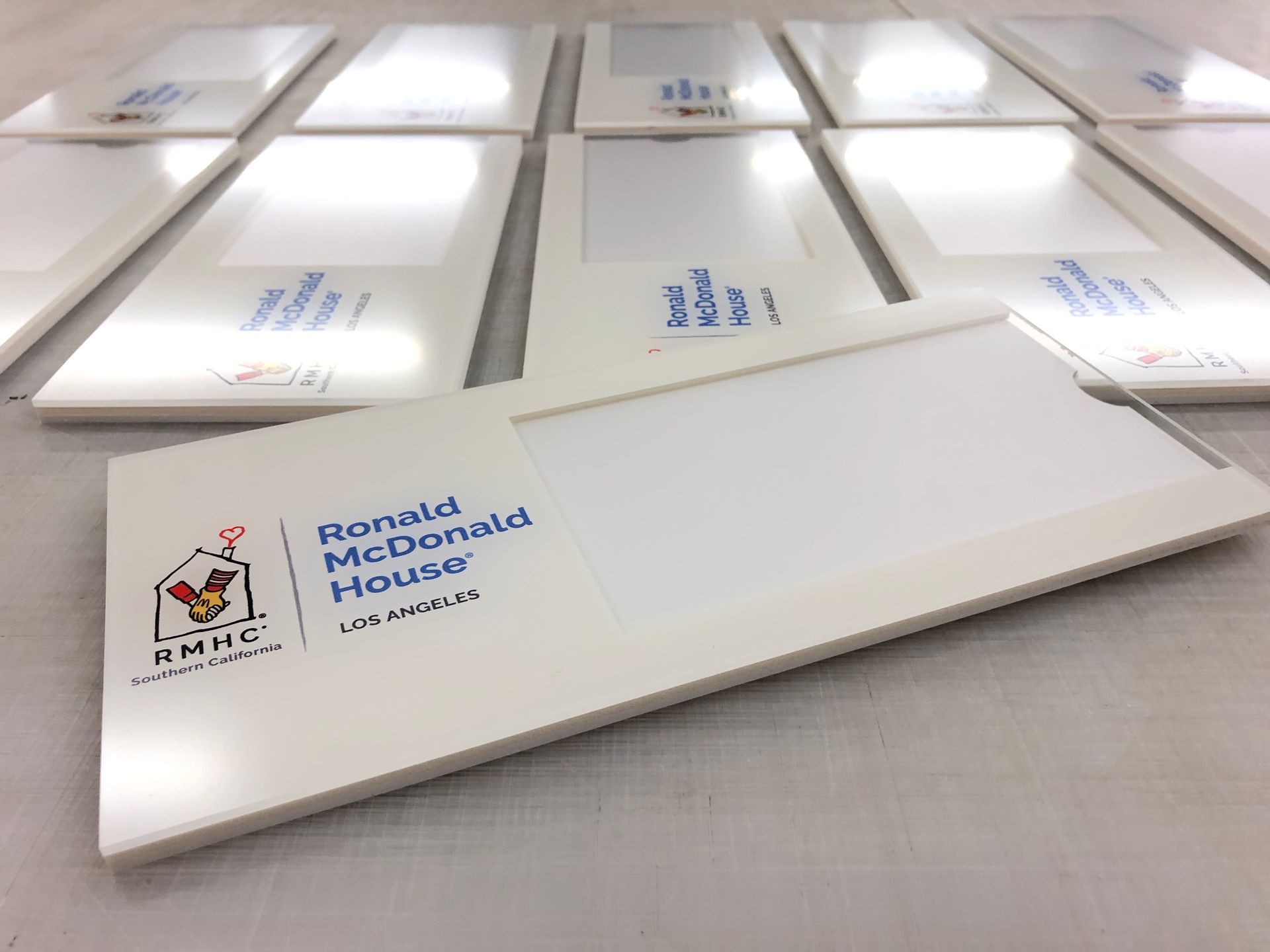 A white envelope that says ronald mcdonald house on it