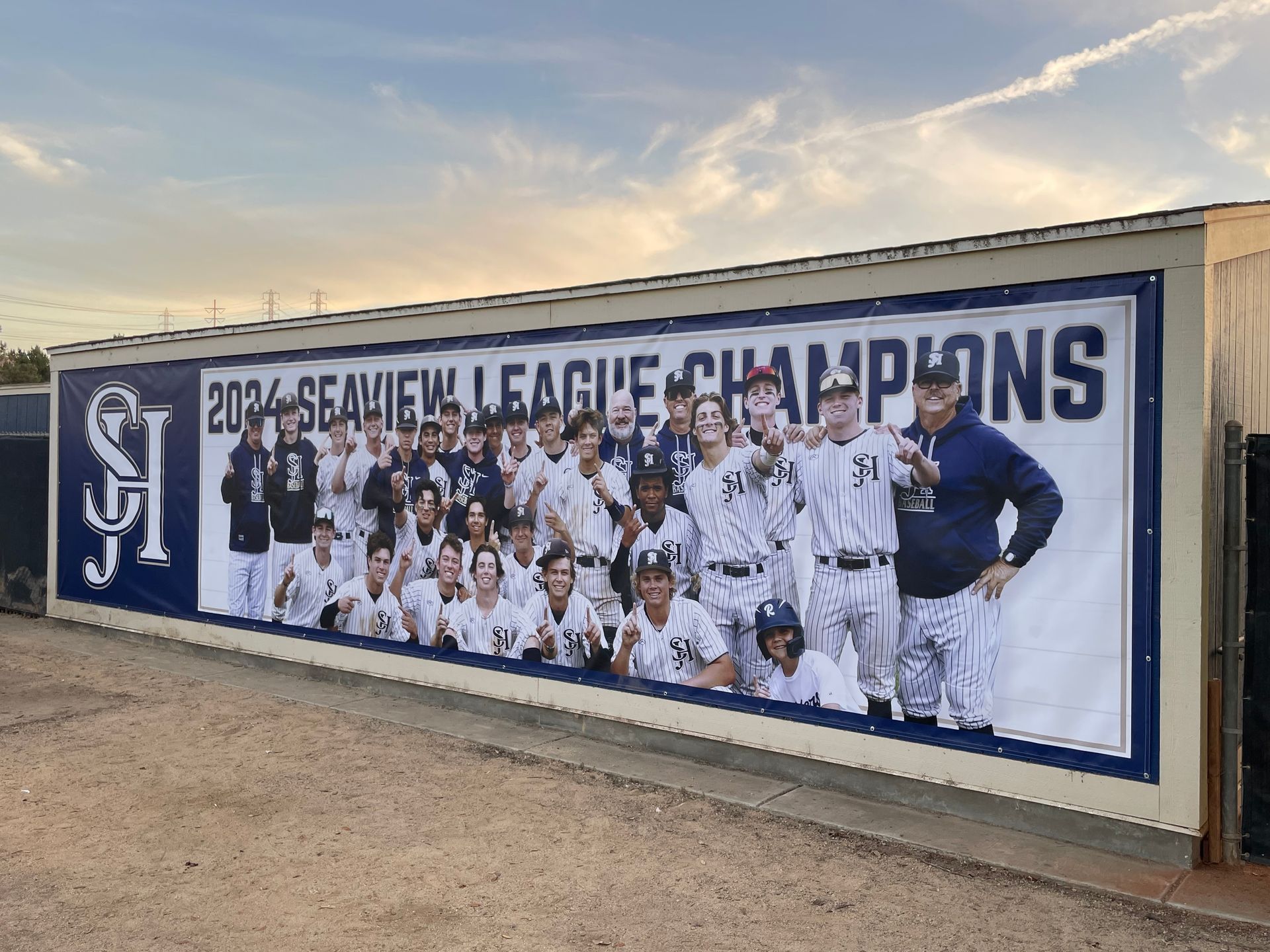 A large billboard with a picture of a baseball team on it.