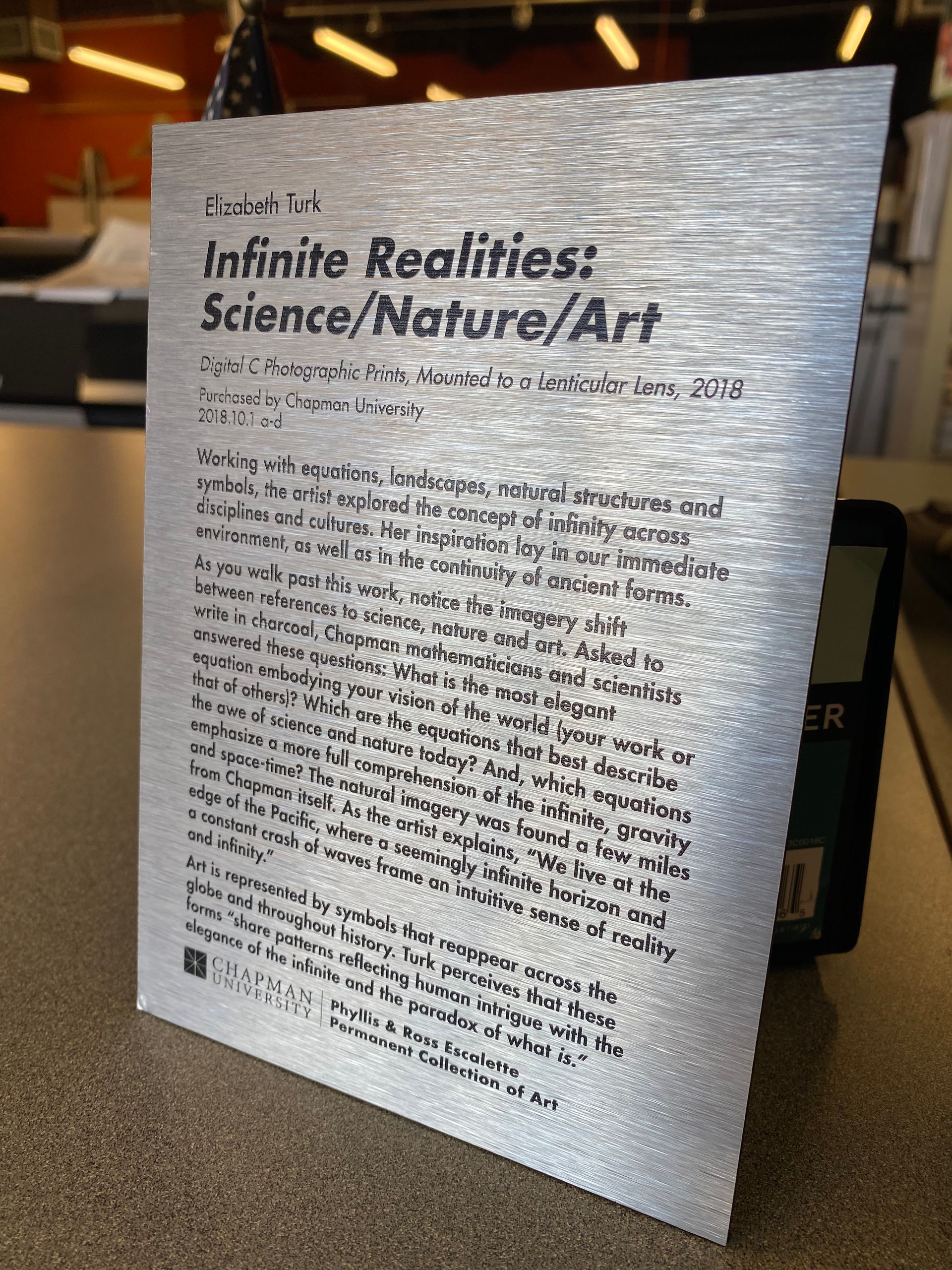 A piece of paper that says infinite realities science nature art