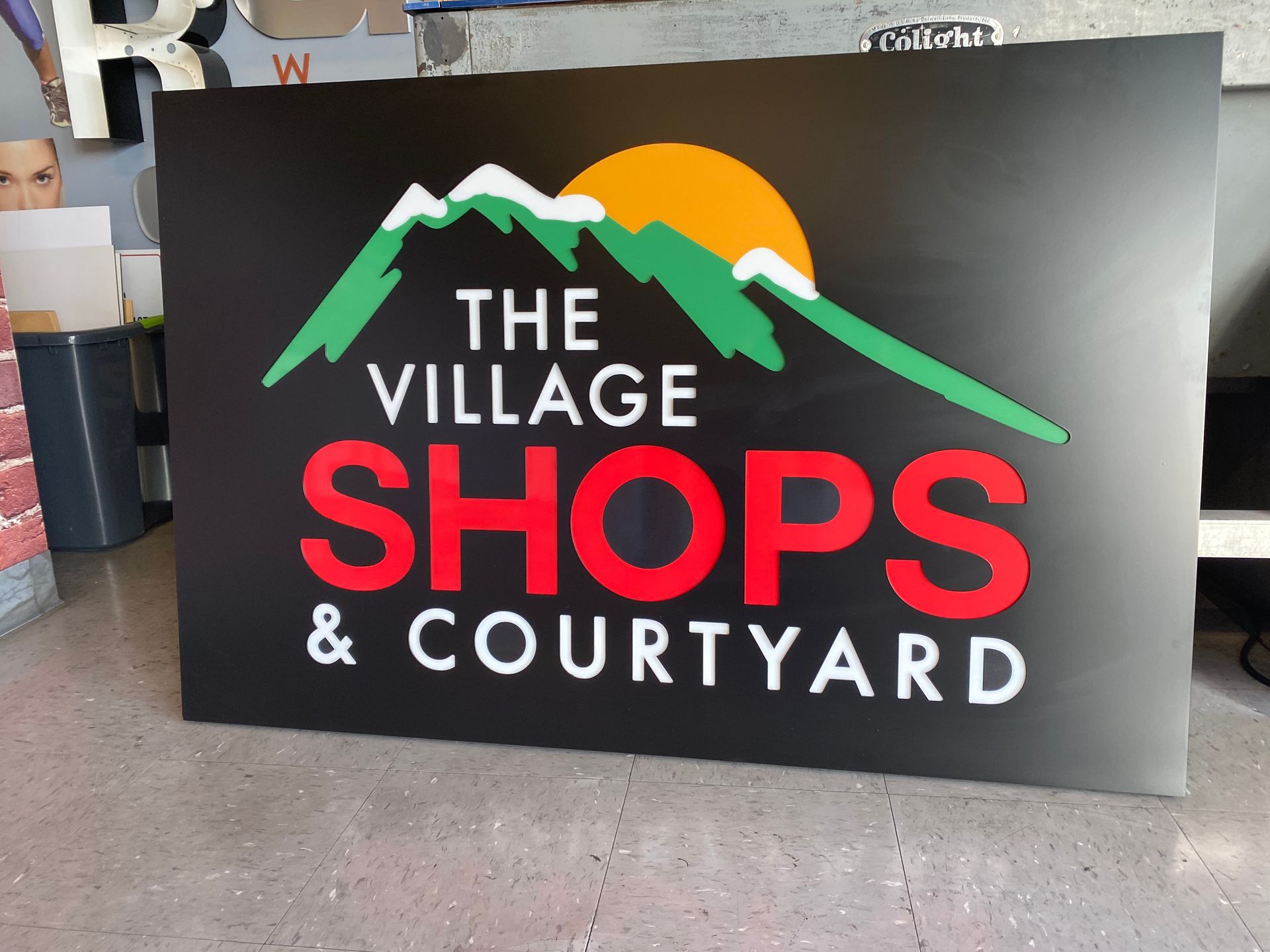 A sign for the village shops and courtyard