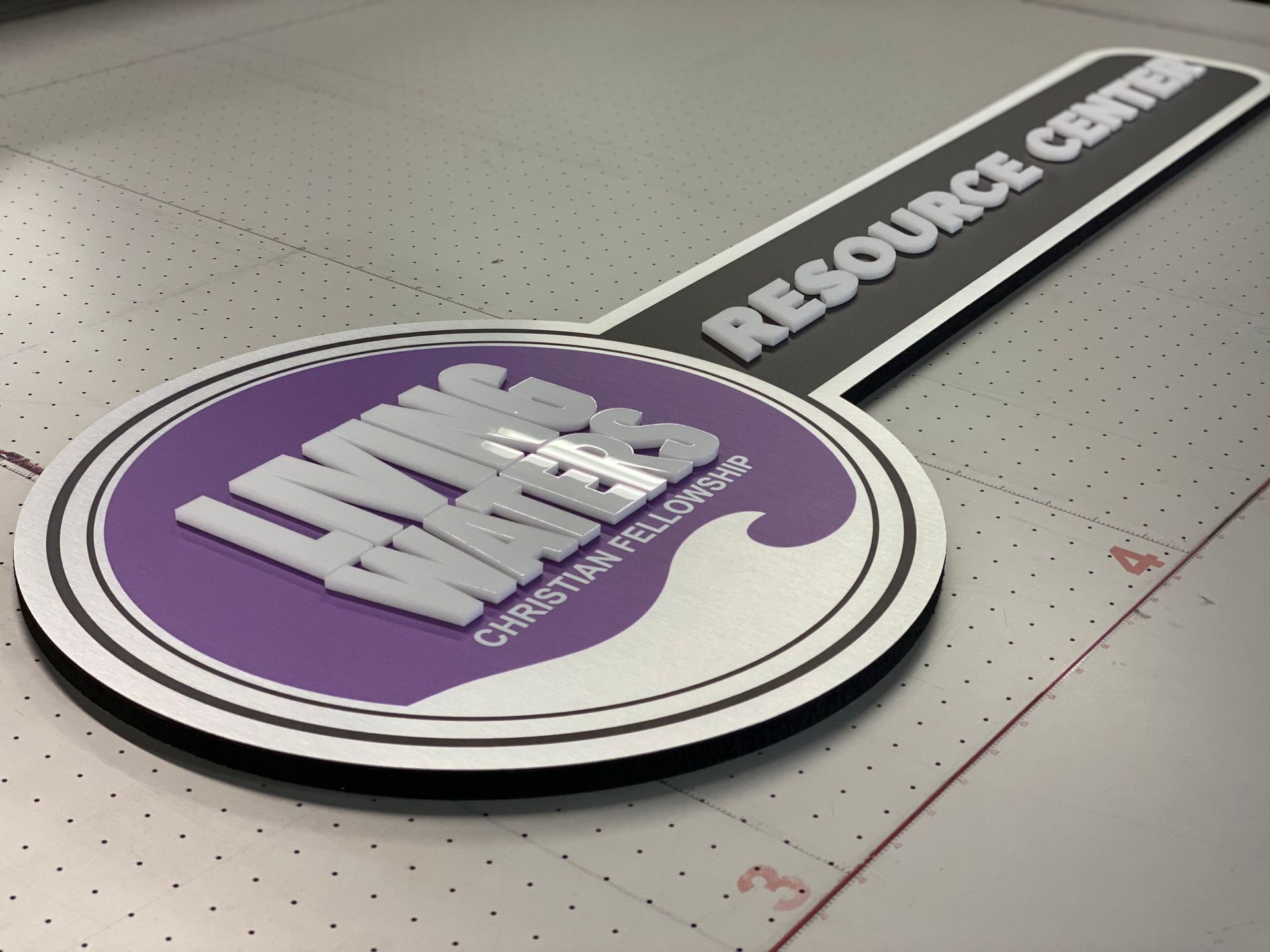 A sign that says resource center on it