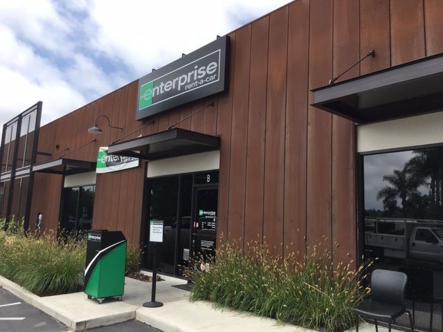 A building with a sign that says enterprise on it