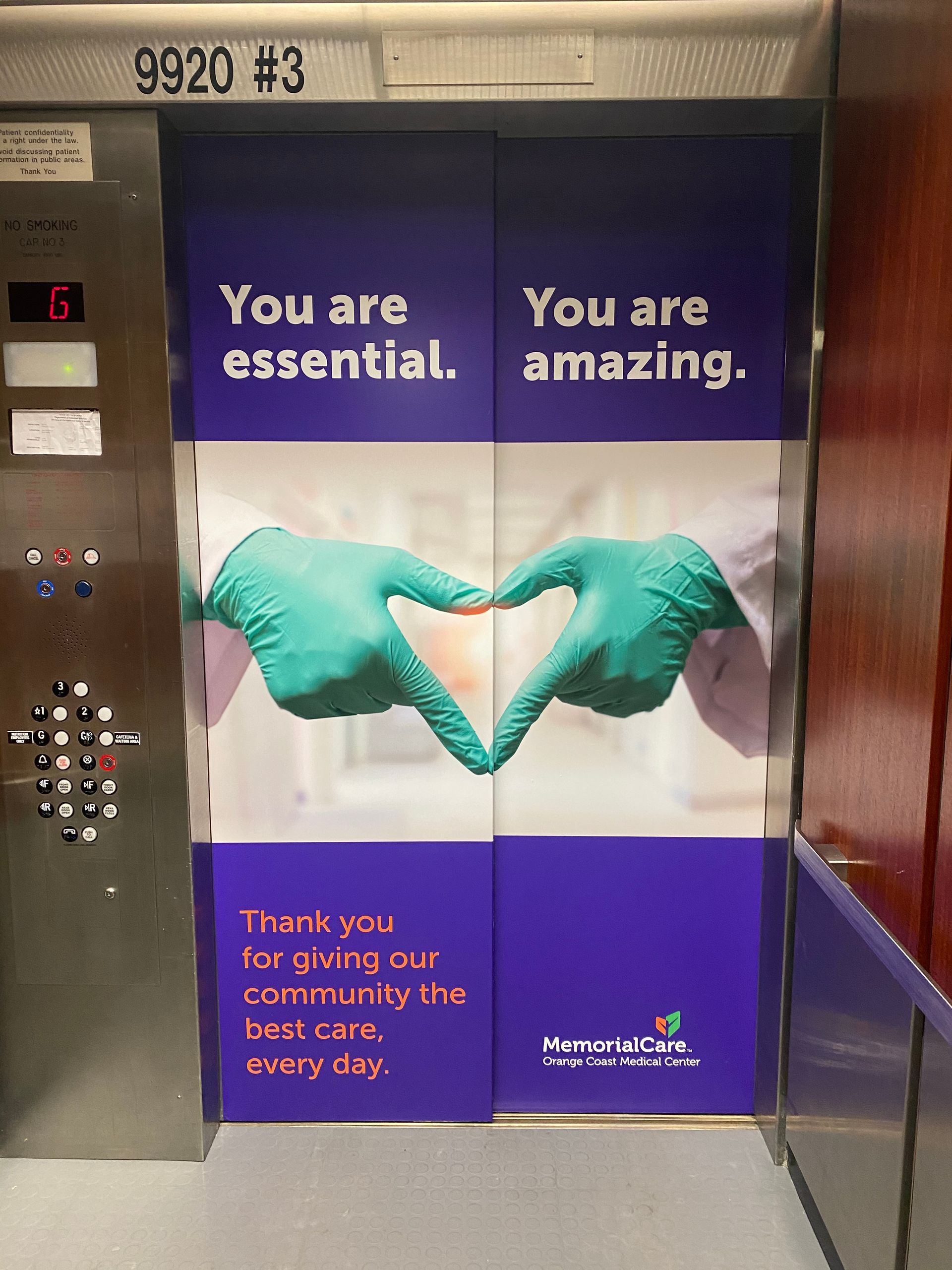 An elevator with a sign that says you are essential and you are amazing
