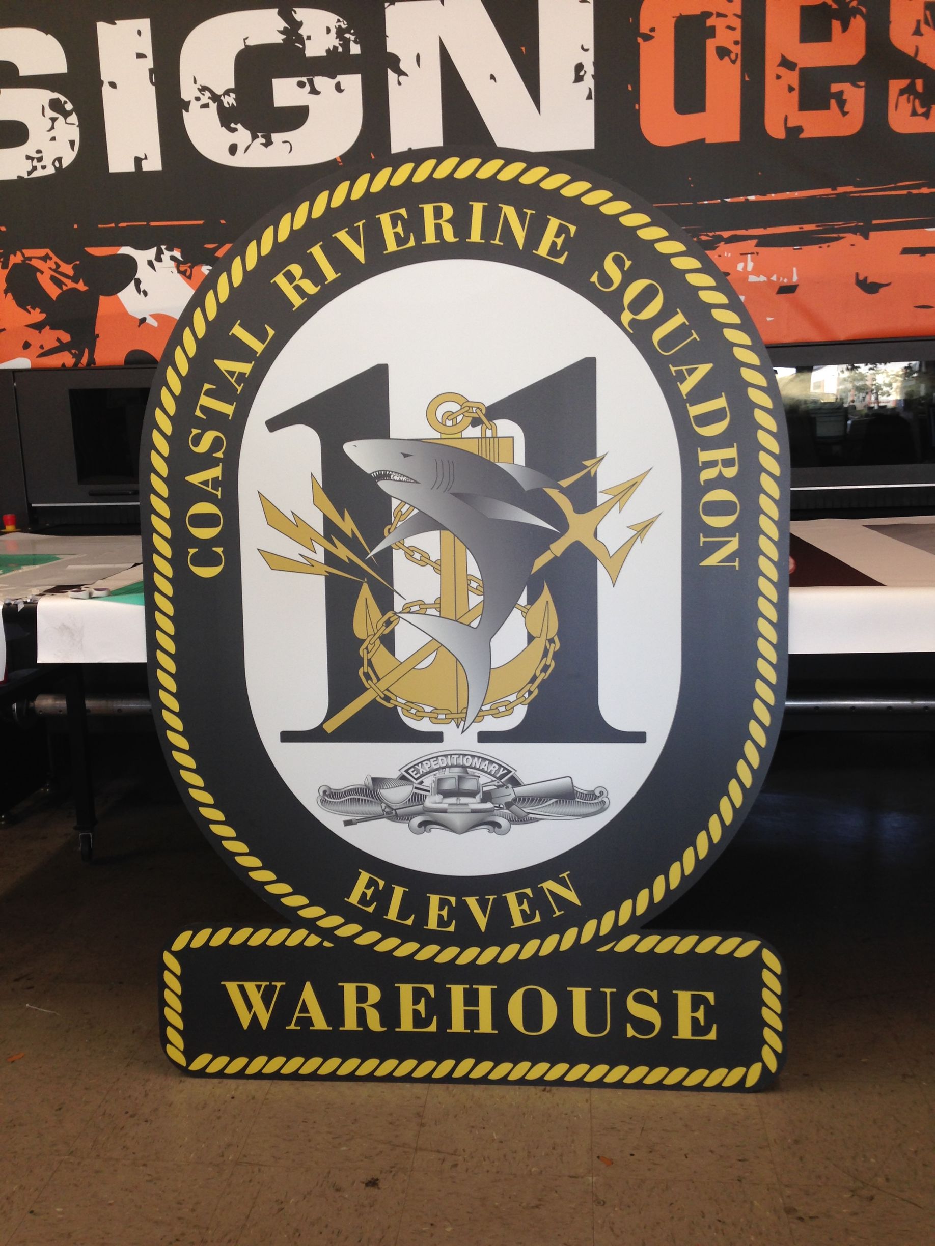 A sign for the coastal riverine squadron eleven warehouse