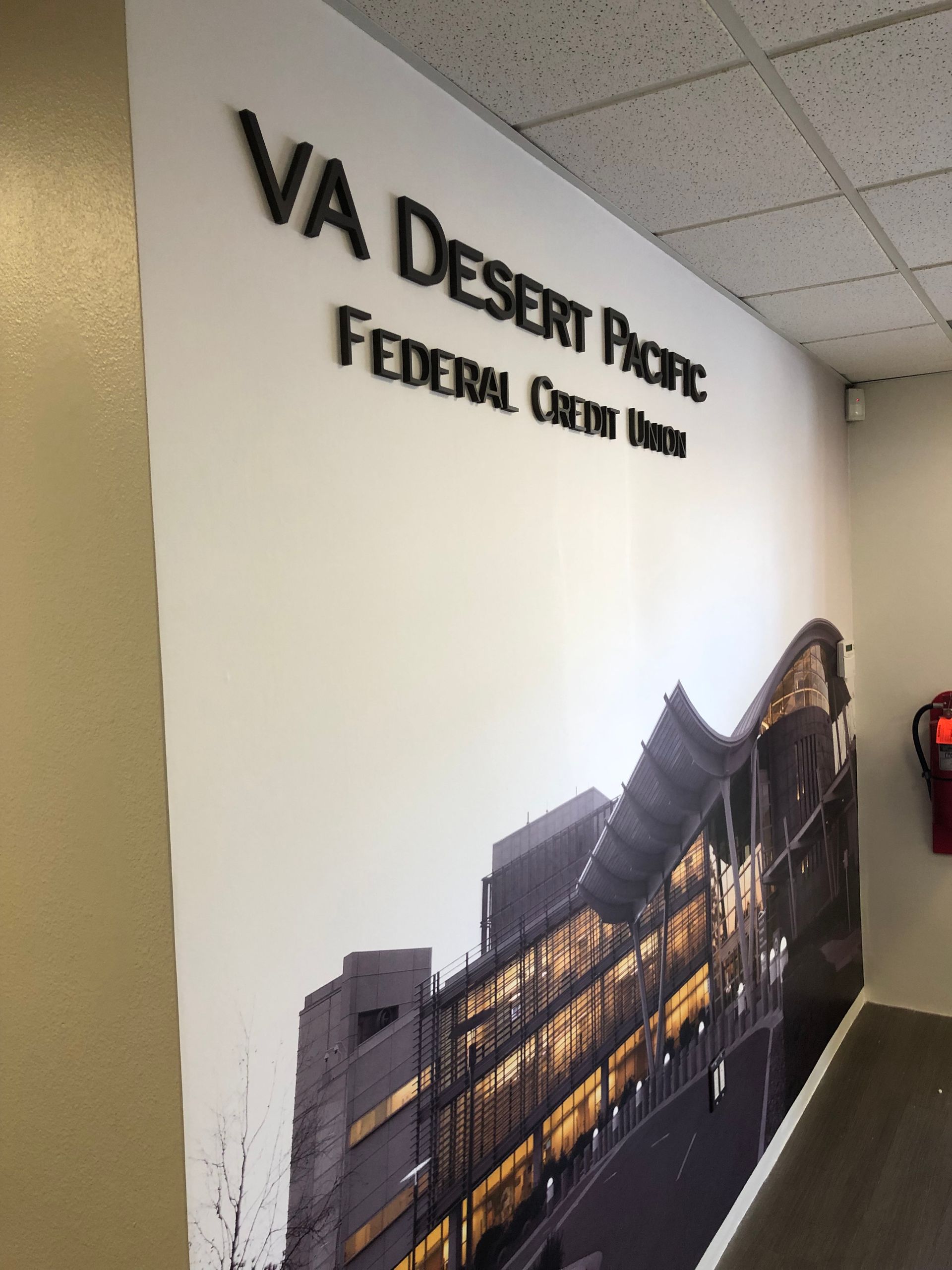 A wall that says va desert pacific federal credit union