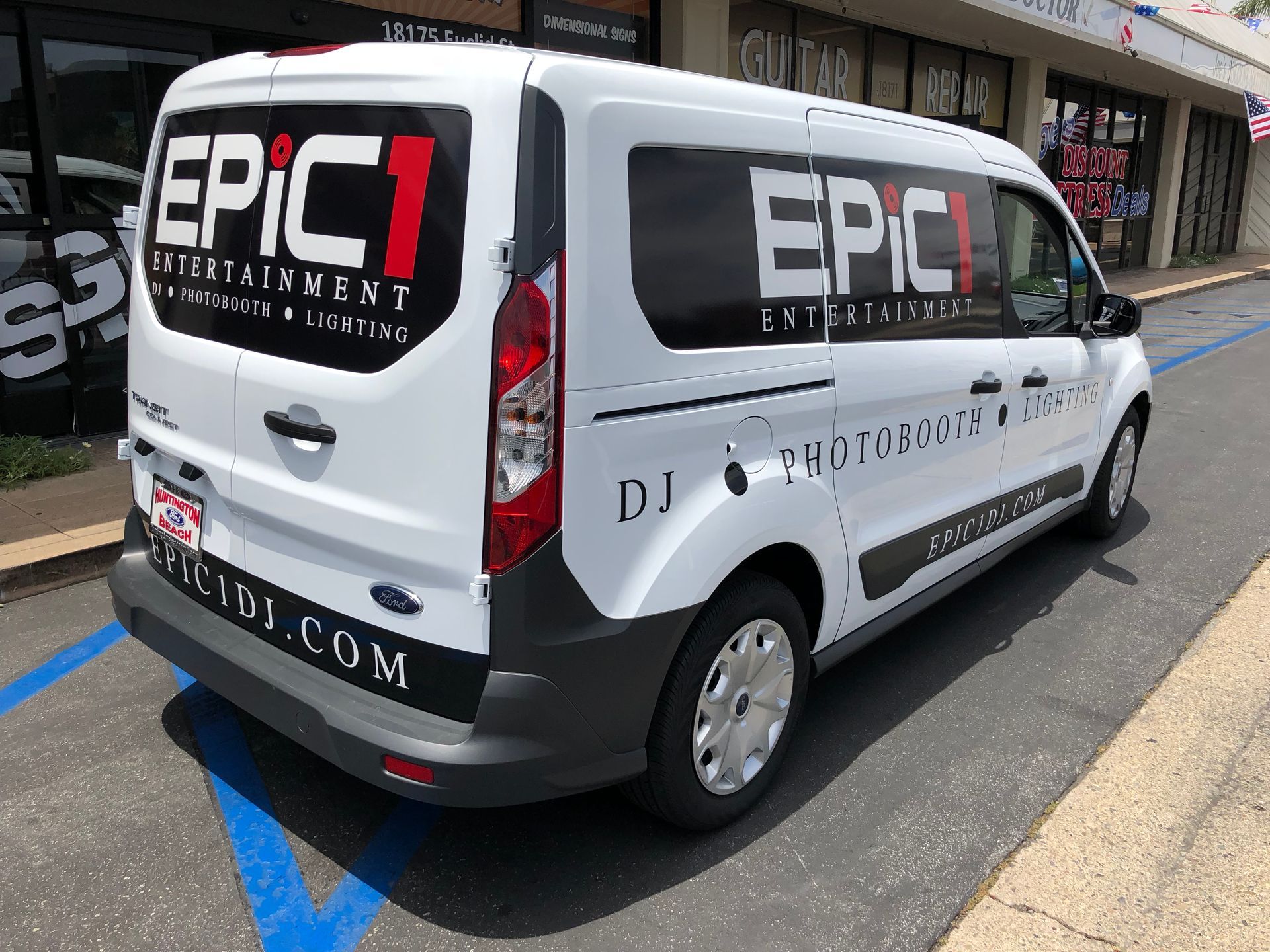A white van with the word epic on it