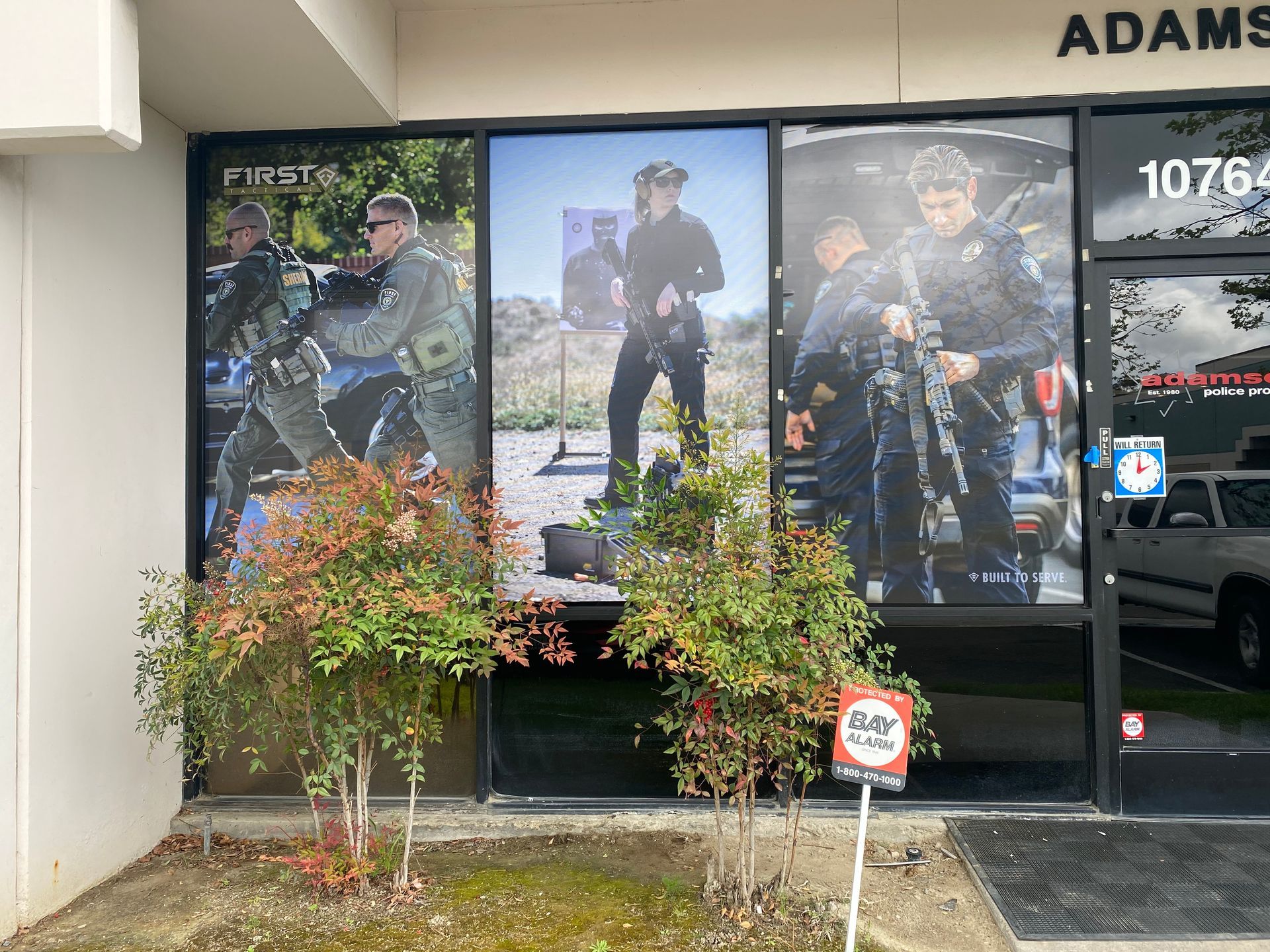 A building with a sign that says adams on it