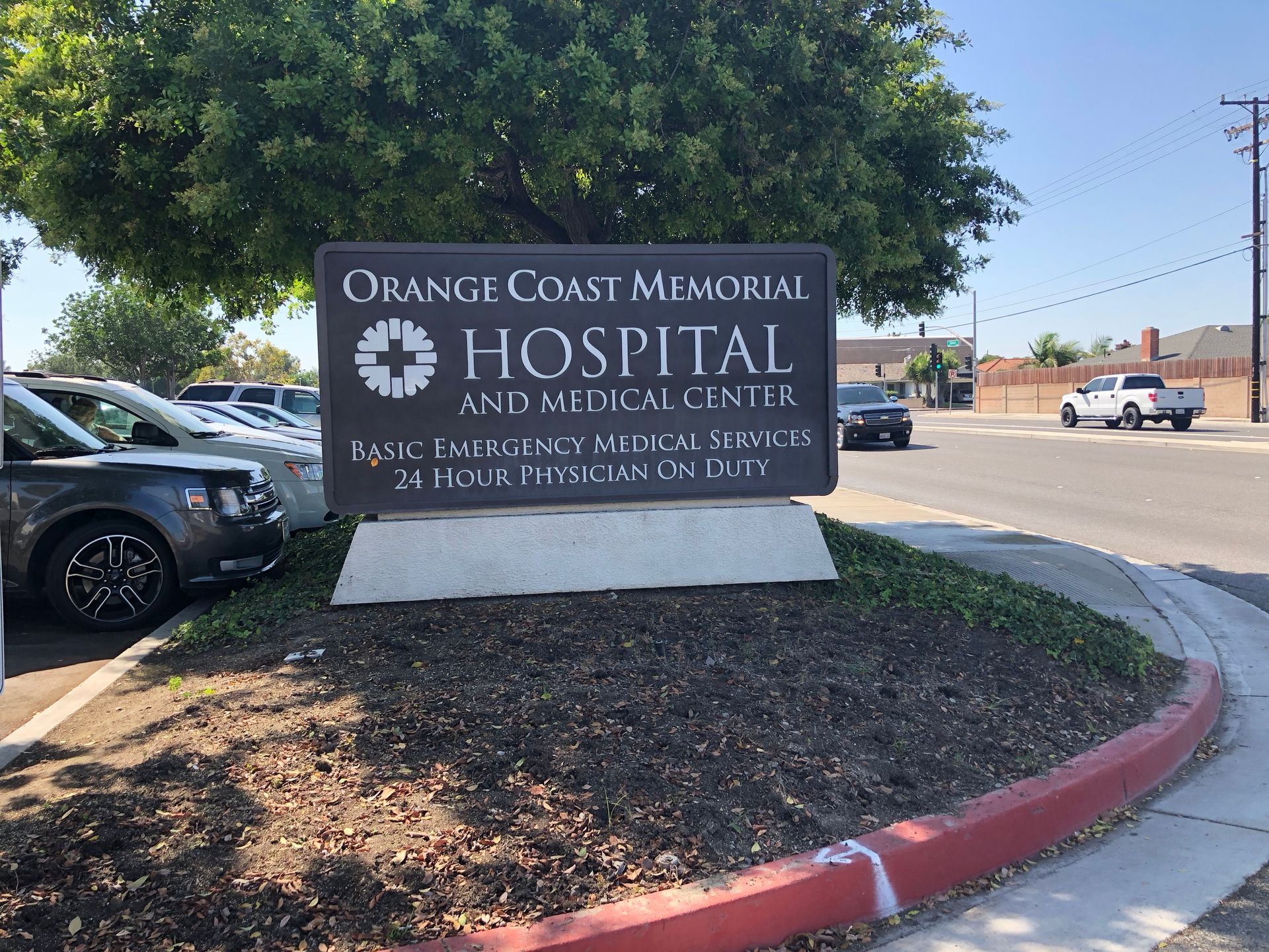 A sign for orange coast memorial hospital and medical center