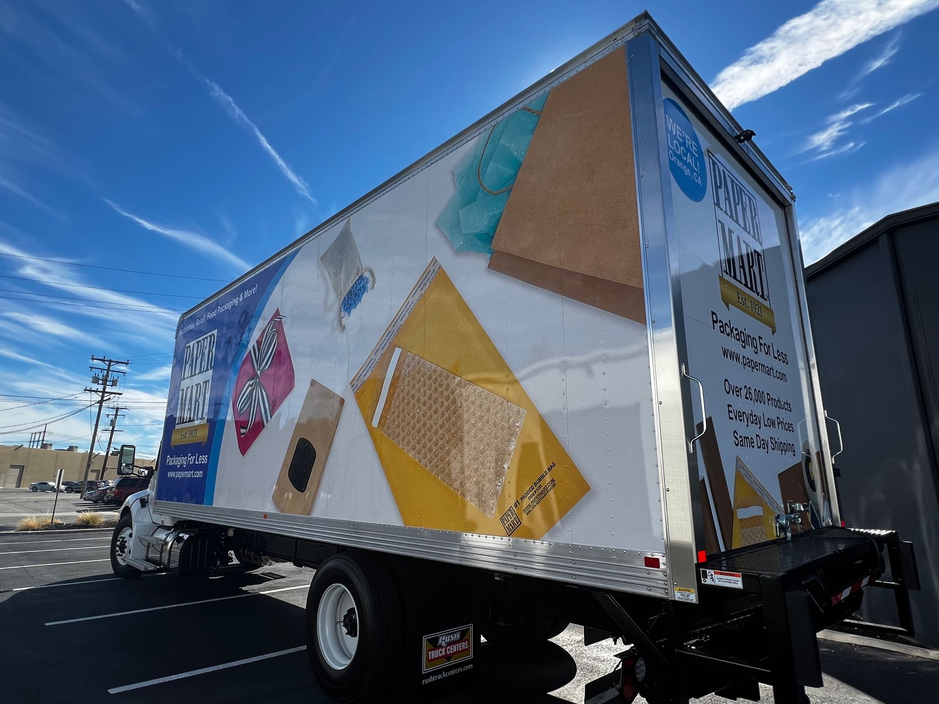 A large truck with a sticker on the back that says ' king size '