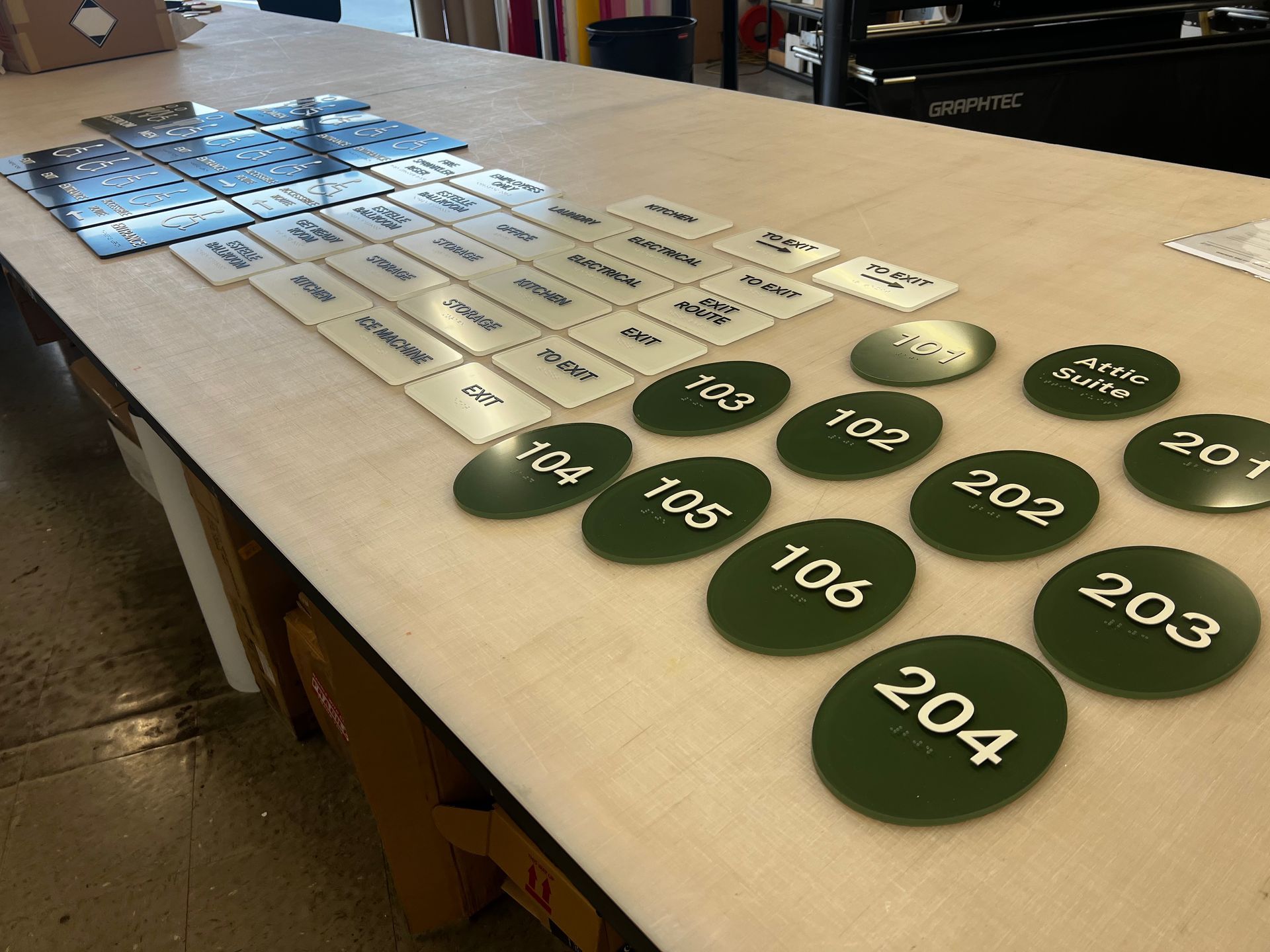 A table with a bunch of green circles with numbers on them