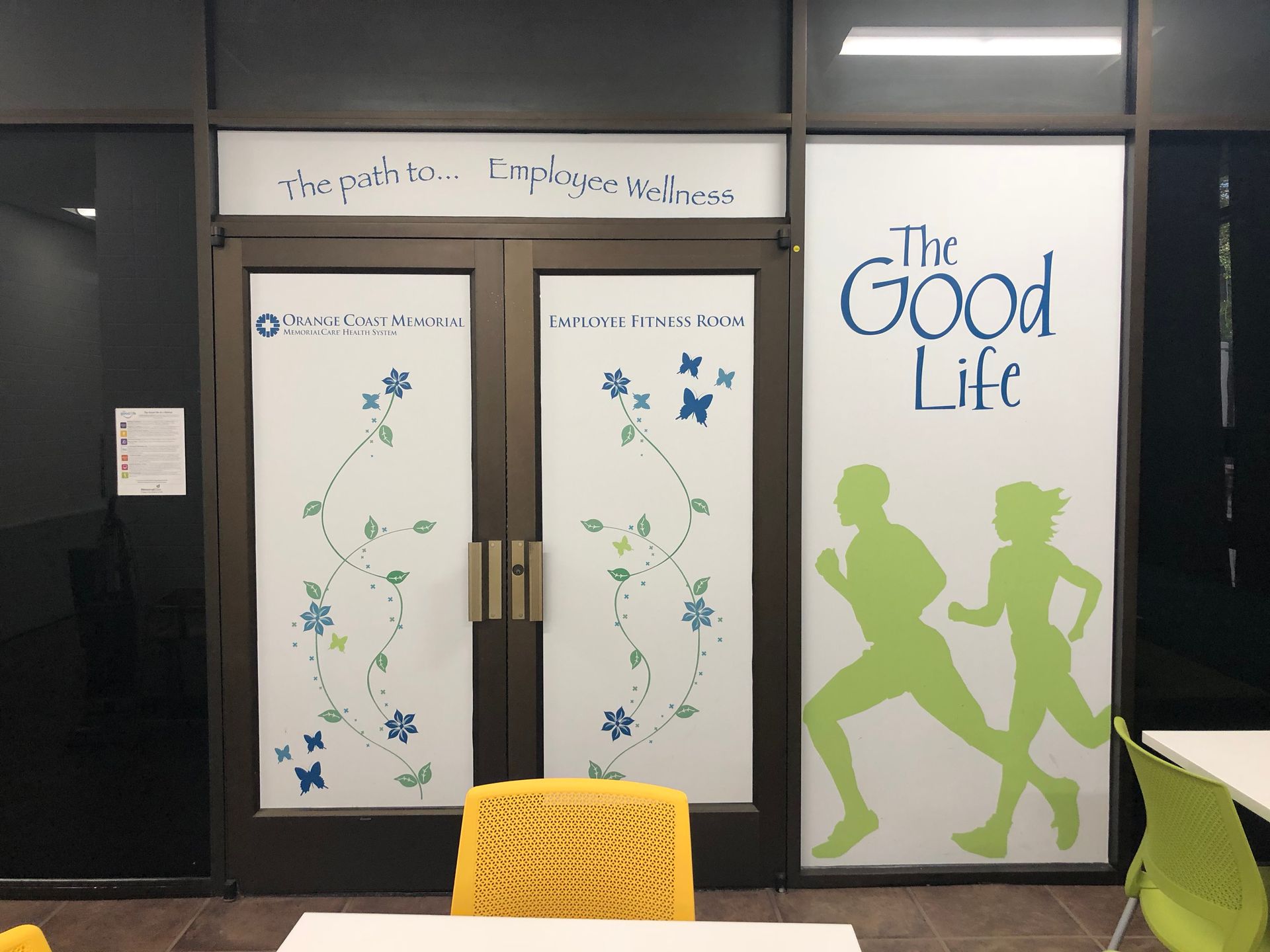 A room with a sign that says the good life