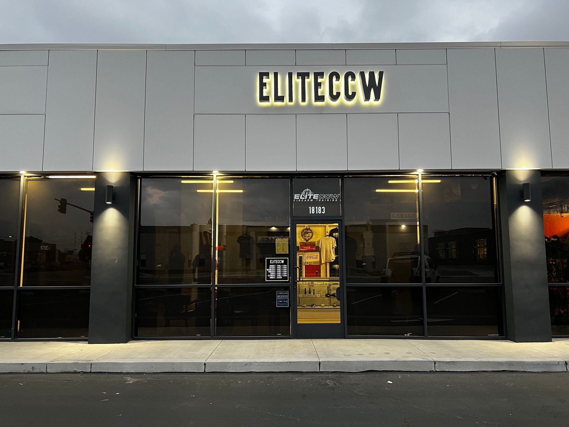 A building with a sign that says eliteccw on it