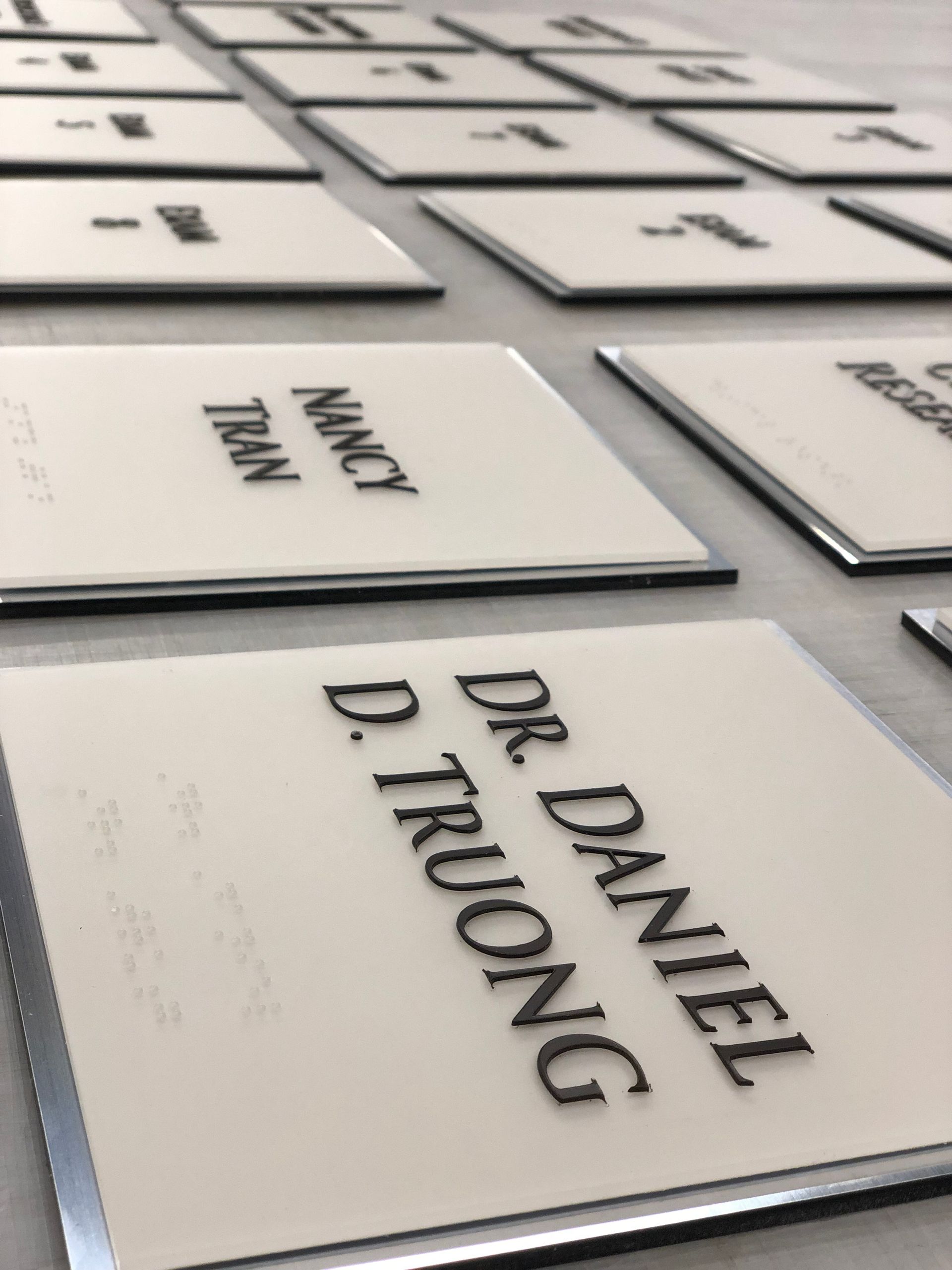 A row of signs for dr. daniel d. truong