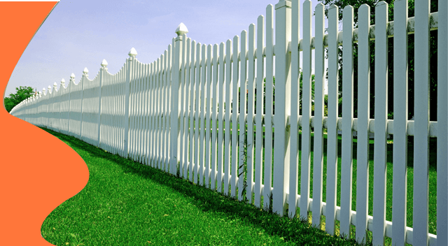 A lane of wood fencing around the home