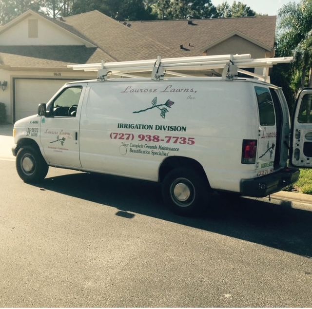 A white van says irrigation division on the side