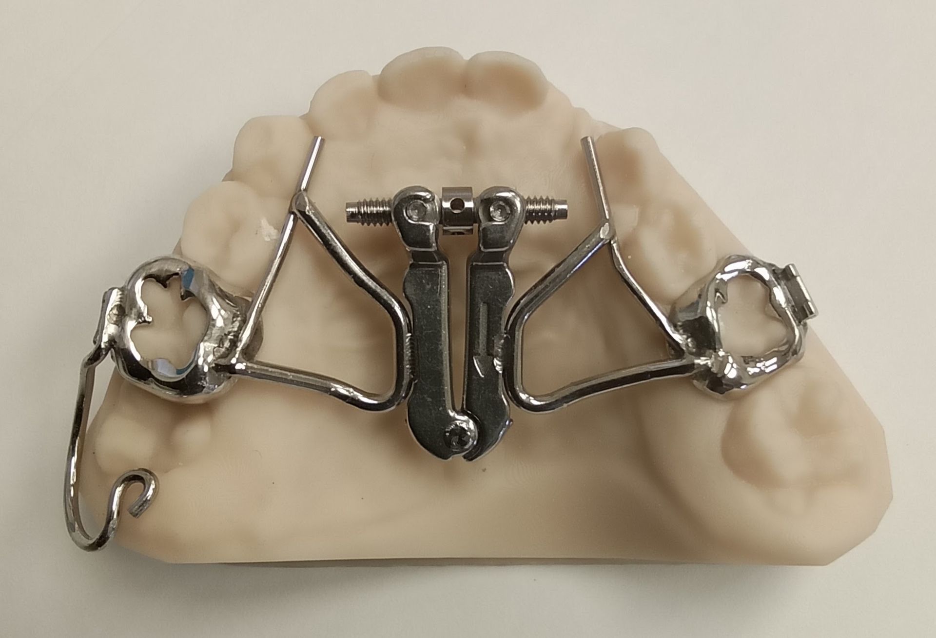 A tooth with a metal brace on it