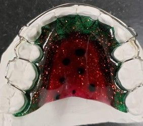 A close up of a tooth with a yin yang symbol on it
