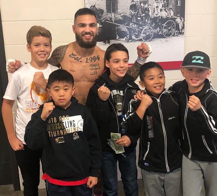 kids with a wrestler