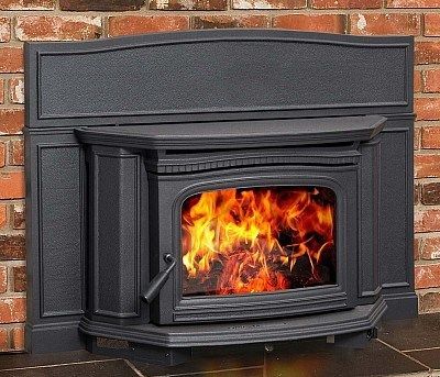 A black fireplace with flames coming out of it