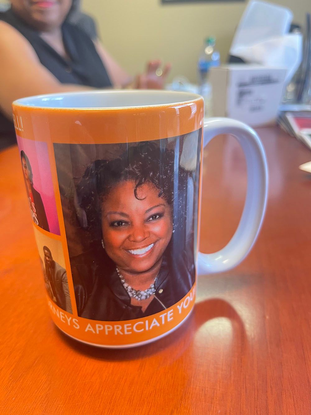 A coffee mug with a picture of a woman on it
