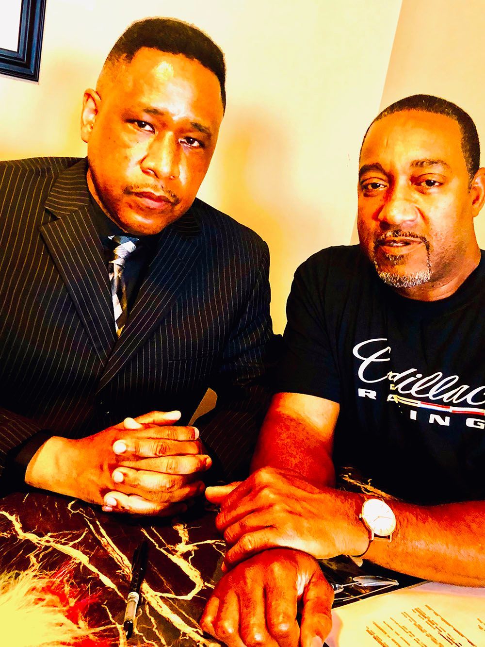 Two men sitting at a table