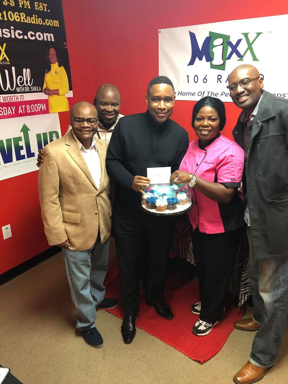 A group of people and Brian D. Poe, Esq. are posing for a picture