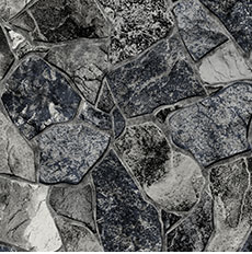 Close-up of a stone wall in shades of gray, black, and white.