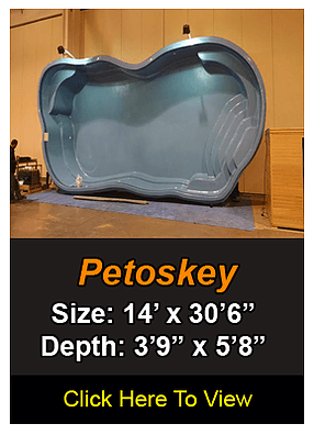 Blue apple-shaped pool, Petoskey model. Size: 14' x 30'6