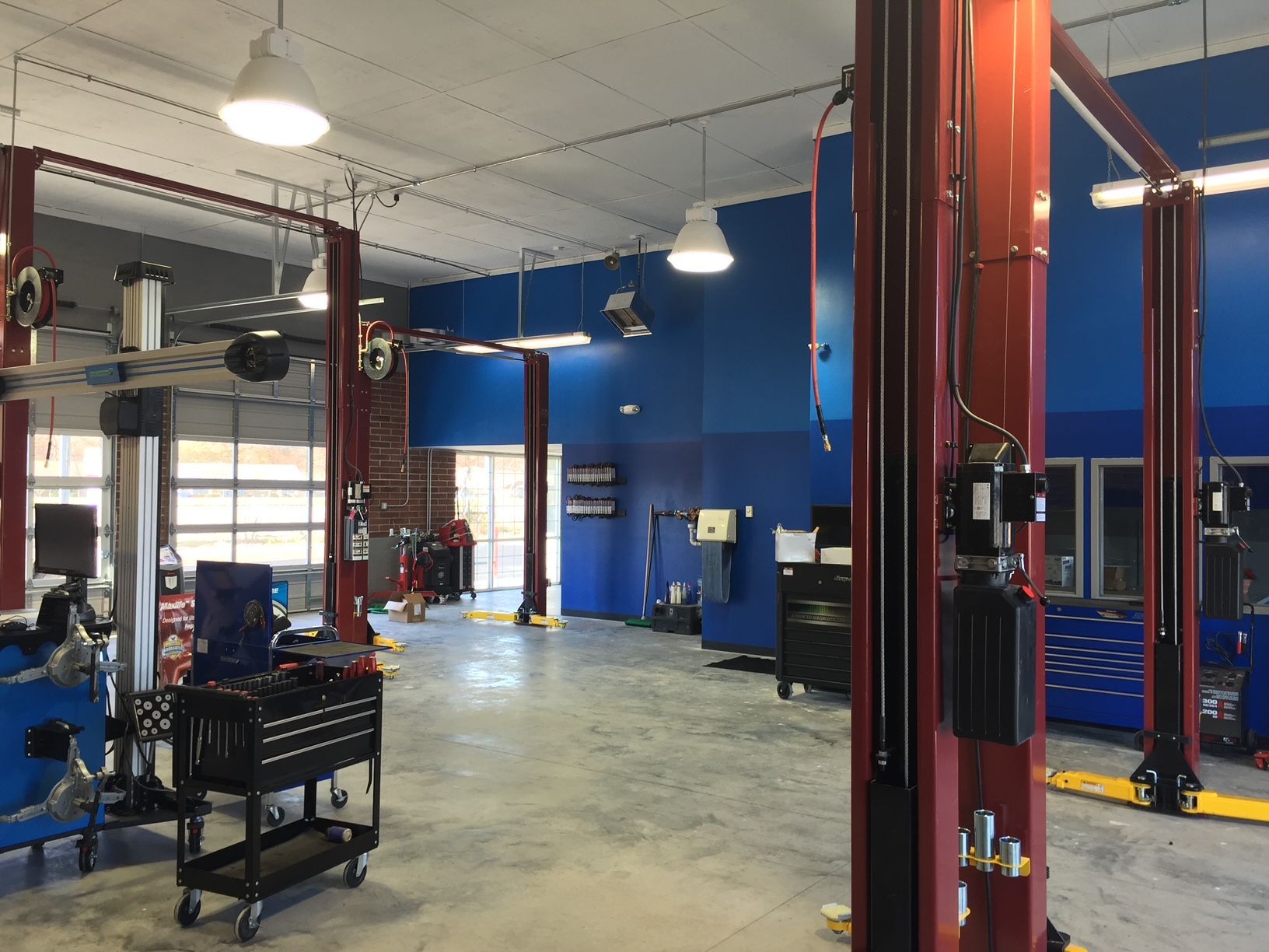 a large garage with a lot of machinery and tools