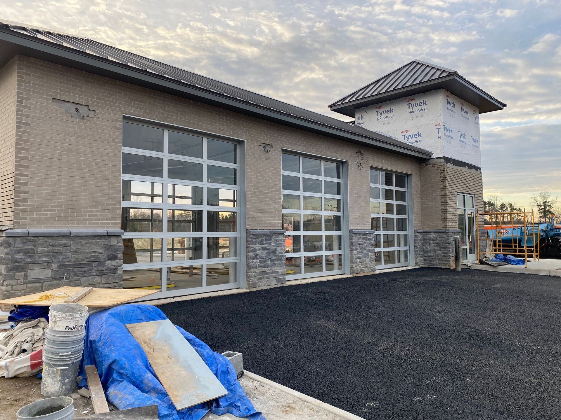 a large building with a lot of windows is being built
