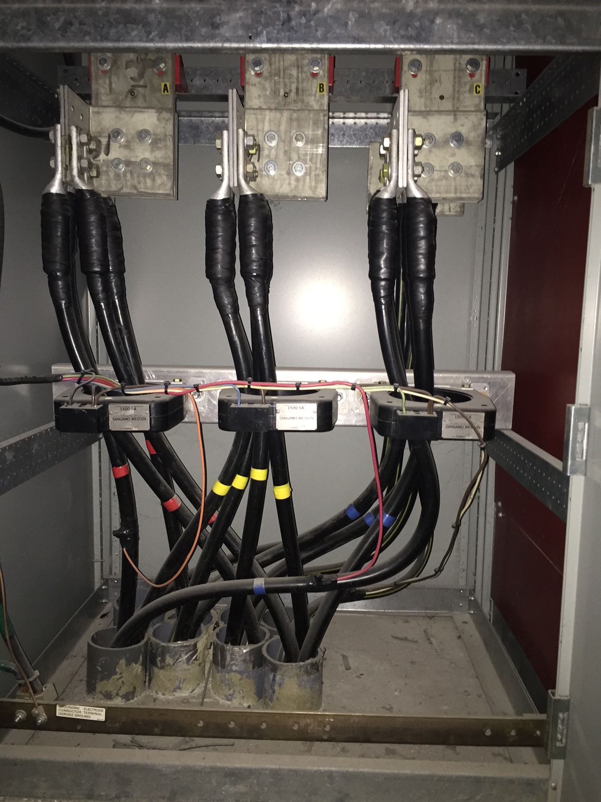 a bunch of wires are coming out of a box