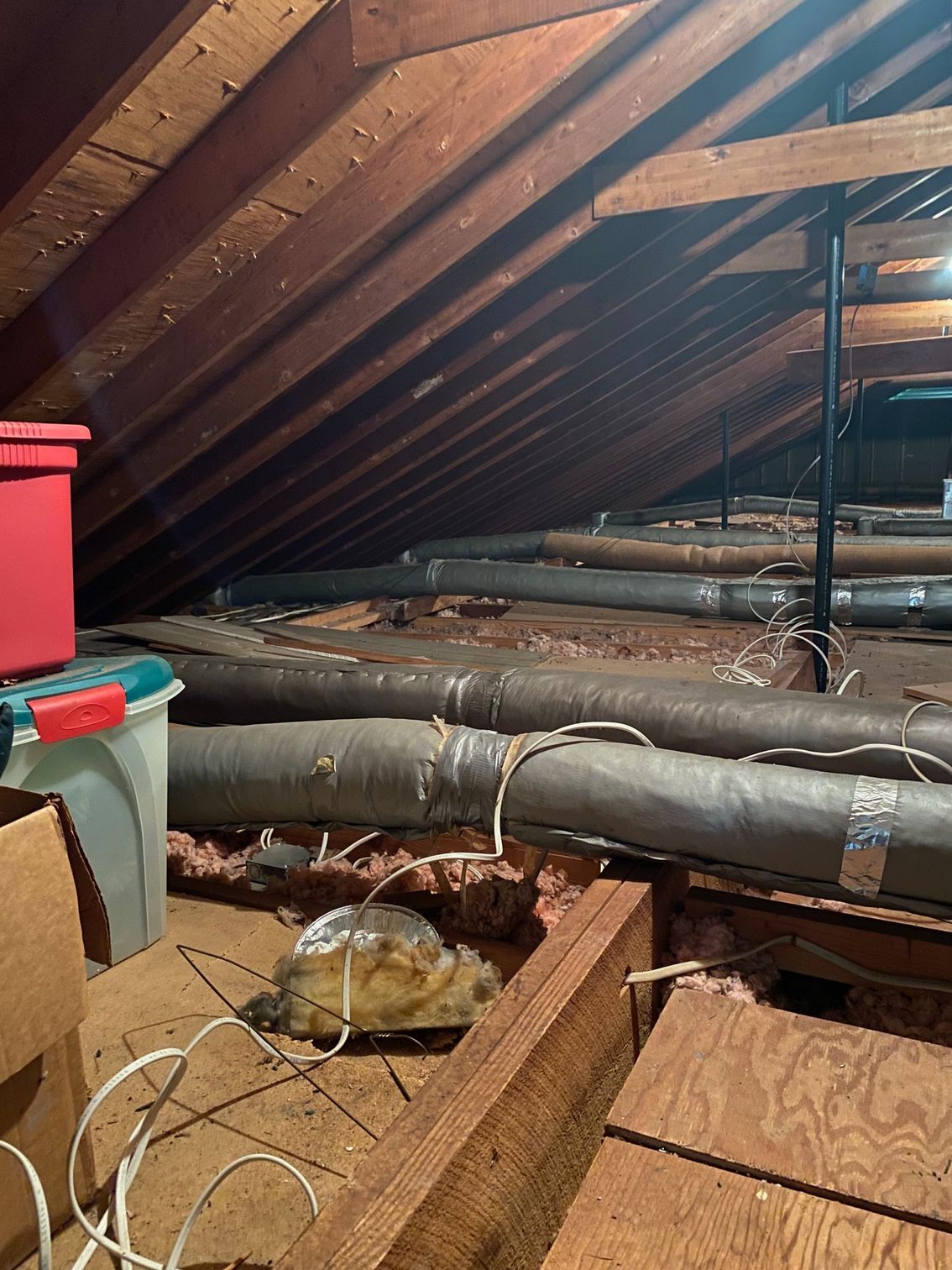 there are a lot of pipes in the attic