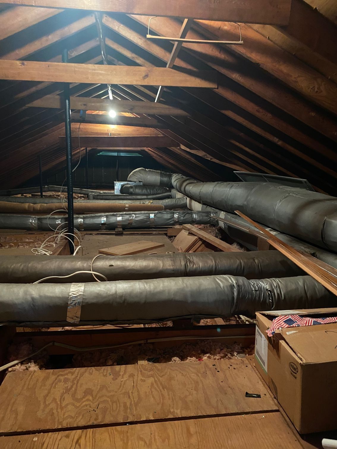there are a lot of pipes in the attic