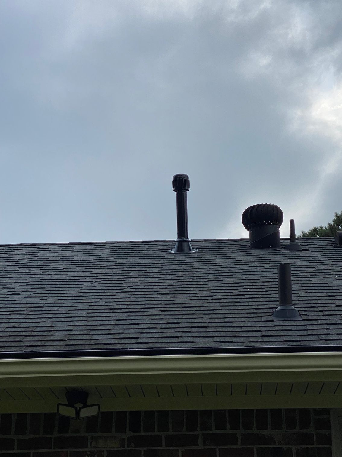 a roof with a chimney on top of it